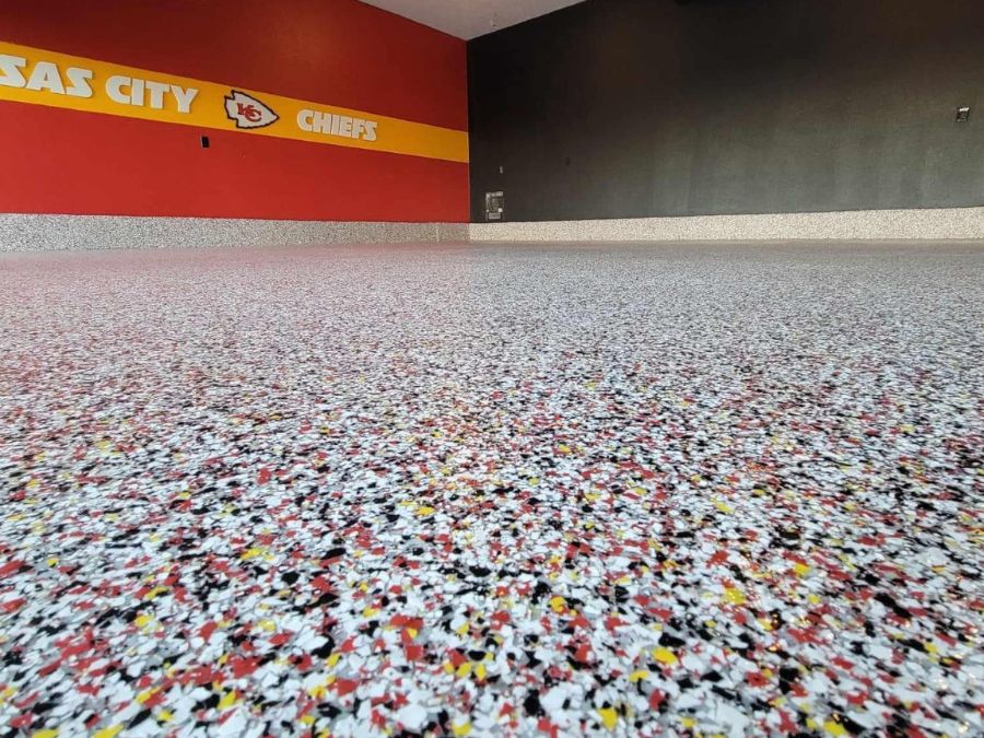 Team-color flake epoxy mancave floor coating Mountain Home AR