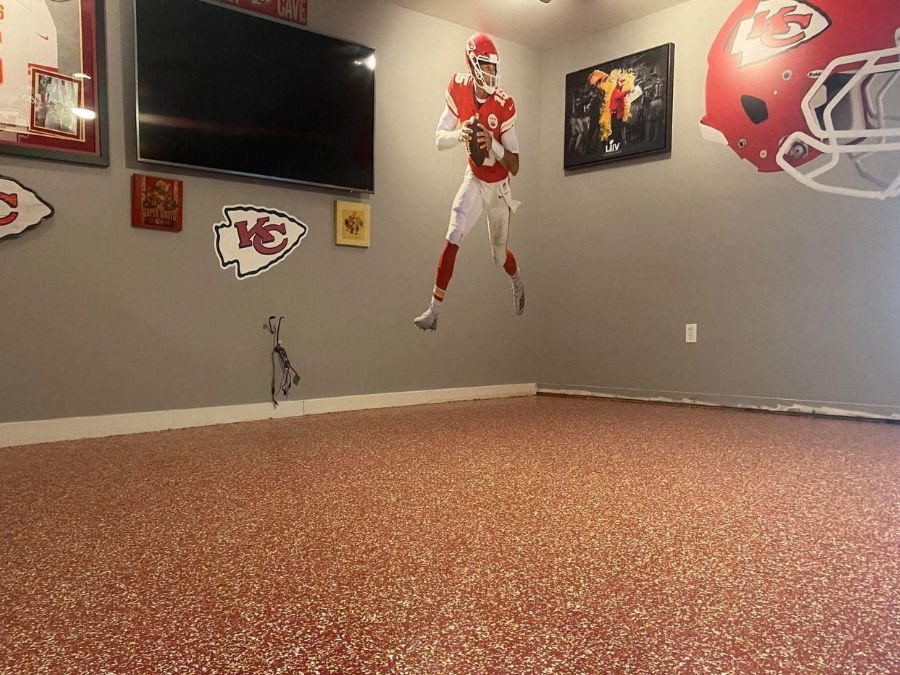 Sports-themed epoxy mancave floor coating Mountain Home AR